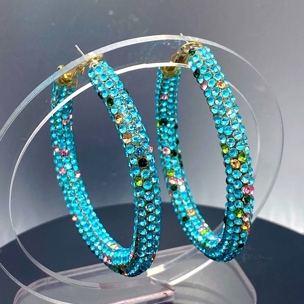 Love the crystal hoops gold tone with mostly blue and multi crystal color